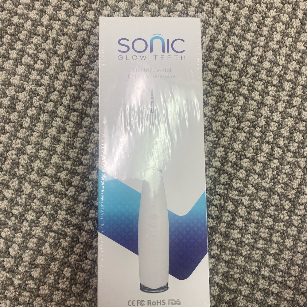 NWT Sonic Glow Teeth Electric Dental Calculus Remover - White